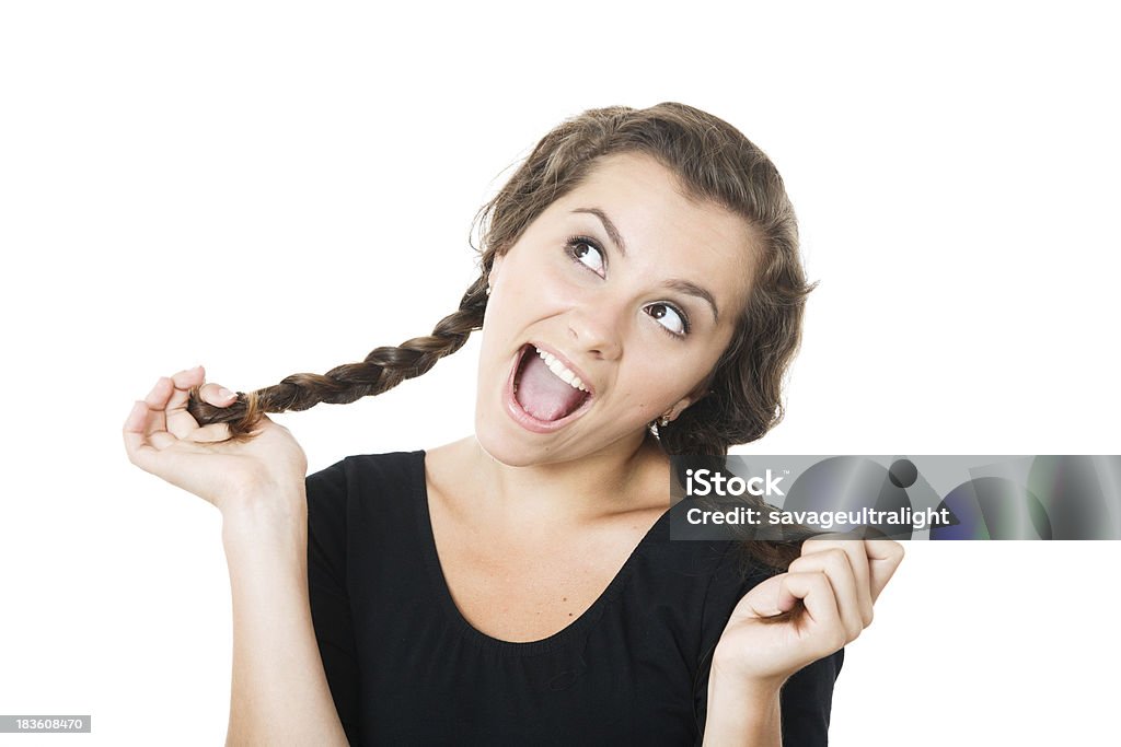 Junge Frau spielt mit ihre Zöpfe - Lizenzfrei Blick nach oben Stock-Foto
