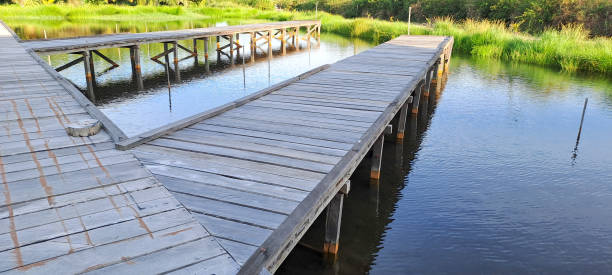 istock Rustic wooden bridge over a pond 1836085194