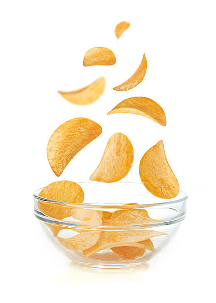 istock Bowl of potato chips isolayed on white 183610186