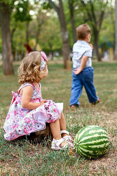 Boy and girl with watermelon