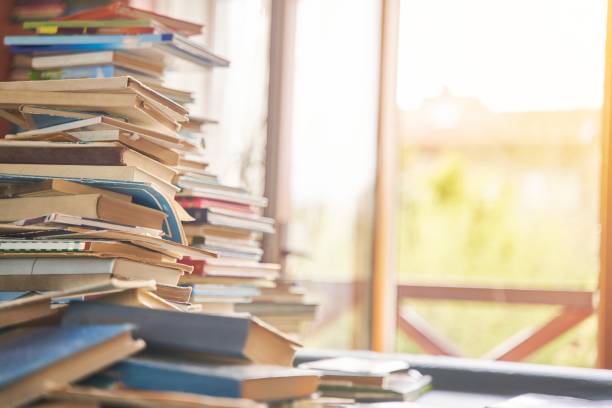istock pile of old books on the table 1836147133