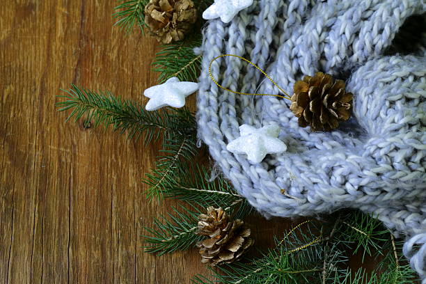 istock Christmas composition with a knitted scarf and decorations 183615876