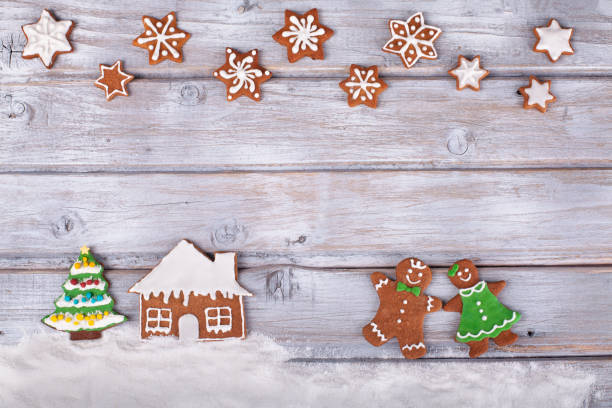 istock Christmas gingerbread cookies on white vintage wooden table 1836167645