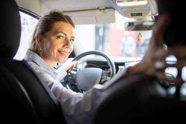 istock Woman is driving a car 1836174996