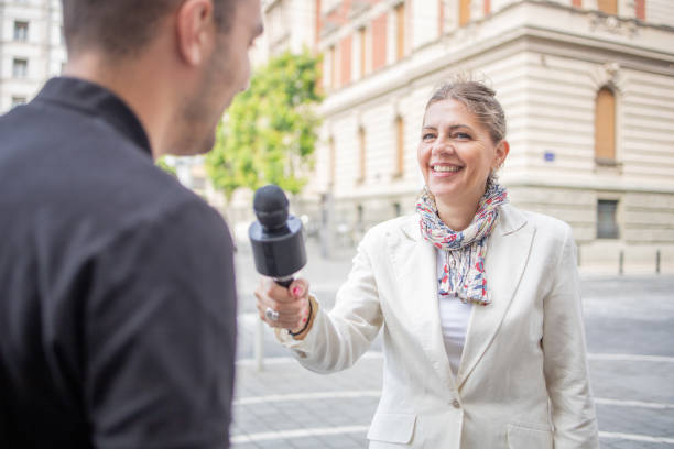 istock TV reporter broadcasting live 1836175519