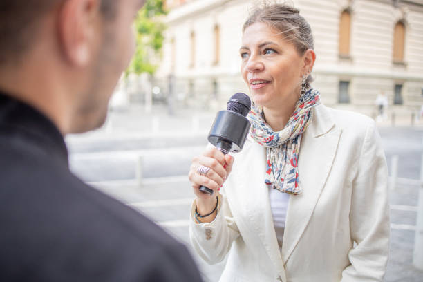 istock TV reporter broadcasting live 1836176046