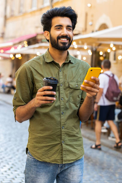 istock Young adult man use smartphone typing text messages browsing internet finishing work chatting online 1836179711