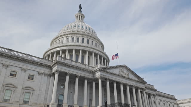United States Capitol Building East Facade with American Flag in Washington, DC
