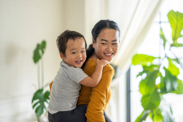 istock Piggyback Rides with Mom 1836214550