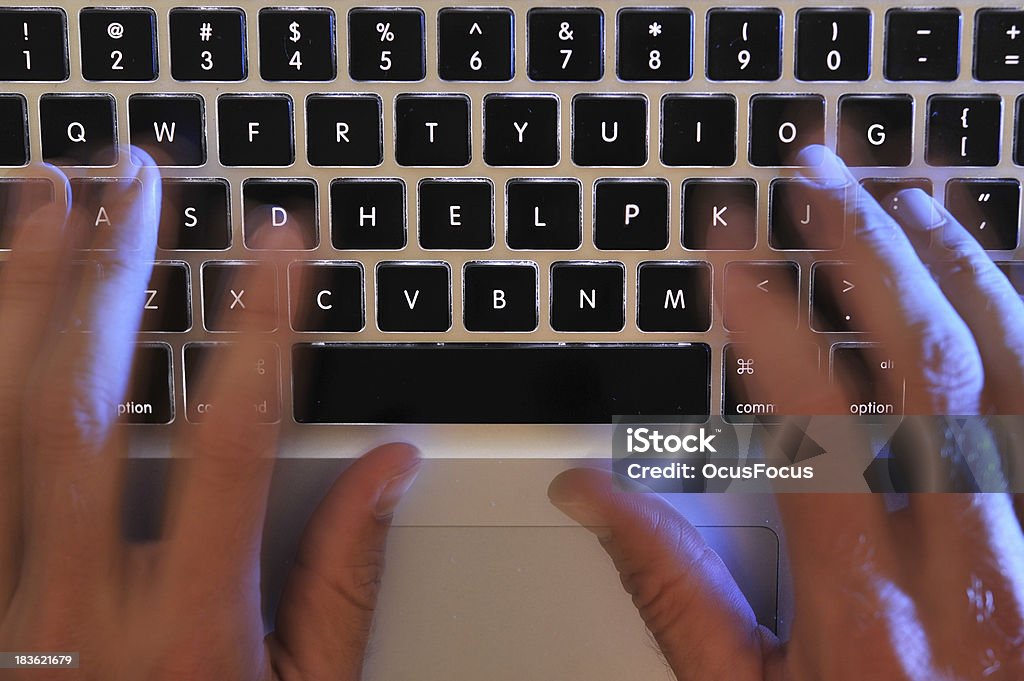 help keyboard over worked close up of a busy hands working on a laptop keyboard with the words help highlighted on the keyboard Addiction Stock Photo