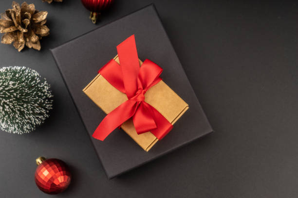 istock Christmas background, Gift box and christmas Decoration on black background. 1836262062