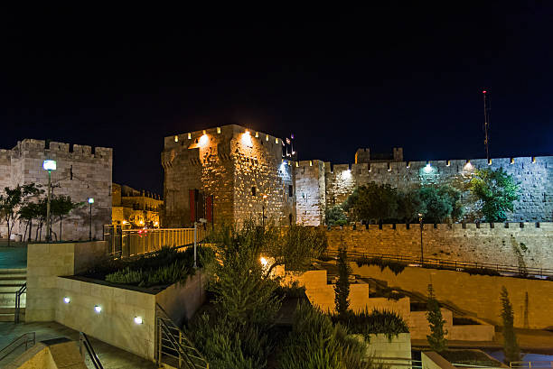 istock Old City of Jerusalem Jaffa Gate against dark sky background 183630272