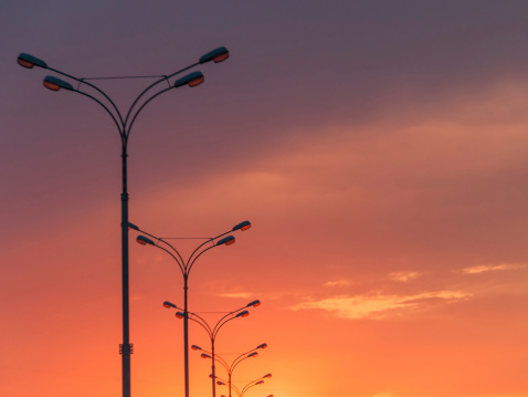 Street lamps against beautiful sunset background. Moscow, Russia.