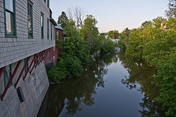 Buildings overlooking the Winooski River in Plainfield, Vermont stock photo