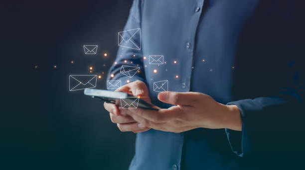 istock close up Man hand using smartphone with popup  email. Get feedback marketing mail. Contact people or customer. 1836319563