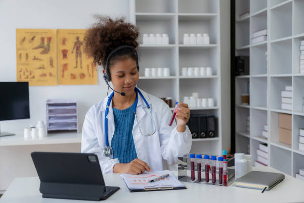 istock African female doctor is researching sclerosis using a microscope in a hospital laboratory. 1836334667