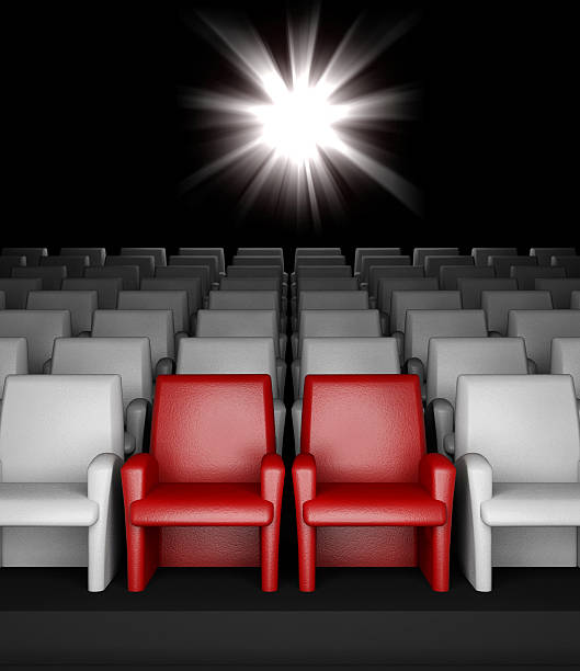 istock Empty cinema hall with auditorium and two reserved seat 183634431