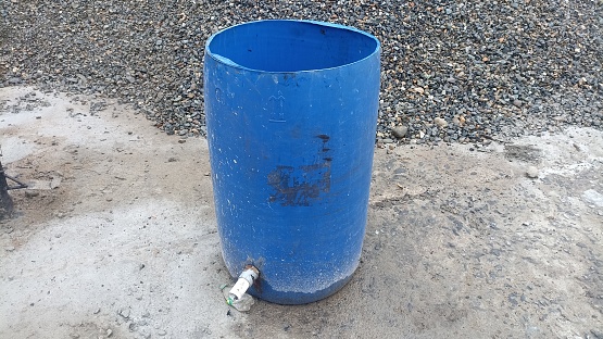 a blue drum made to store water