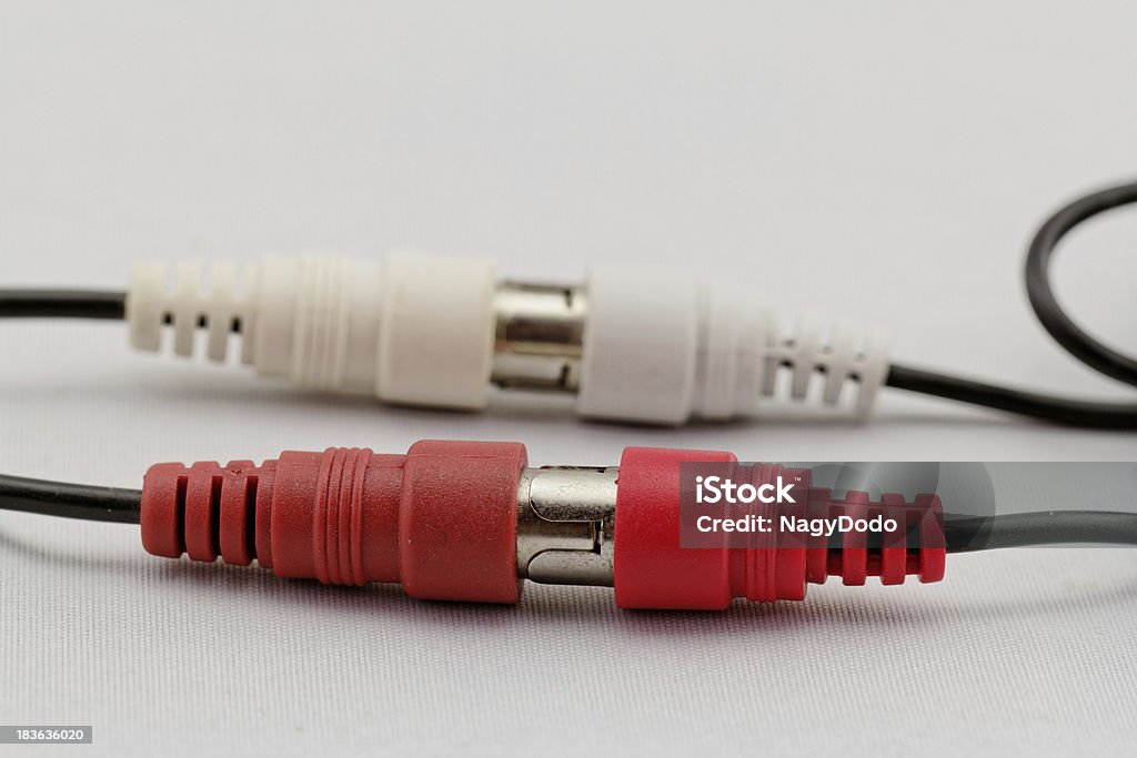 audio RCA cable on a white background correct conection between left - right audio RCA cable on a white background (red white) Adult Stock Photo