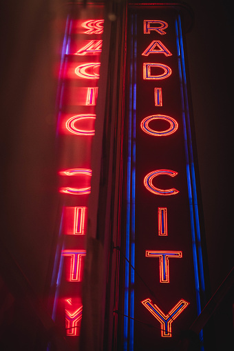 Radio City Music Hall marquee in the rain. December 2023. New York City, NY. USA