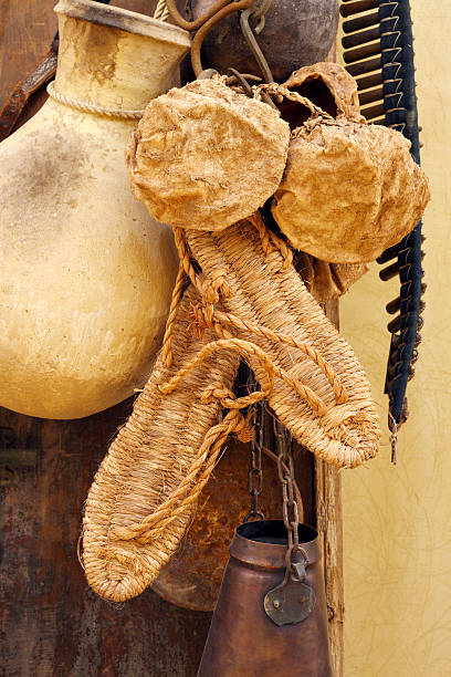 istock Ancient Arabic desert sandals and water containers 183639421