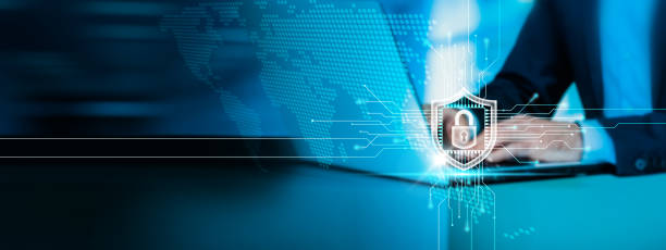istock Businessman ensures cybersecurity using a laptop and focuses on internet technology and data protection. 1836401327