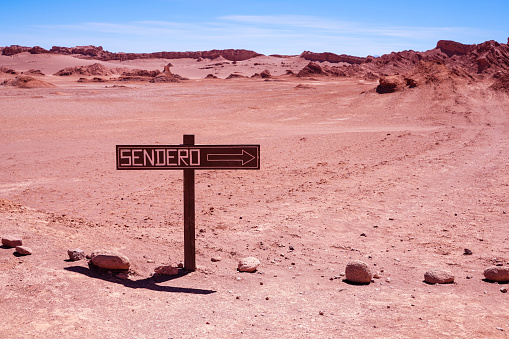 Guide sign on Sand dune in the Atacama Desert
