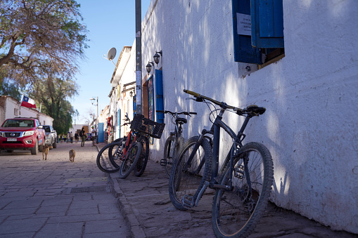 Bicycles on Caracoles Street, the main street of San Pedro, San Pedro de Atacama, Chile.