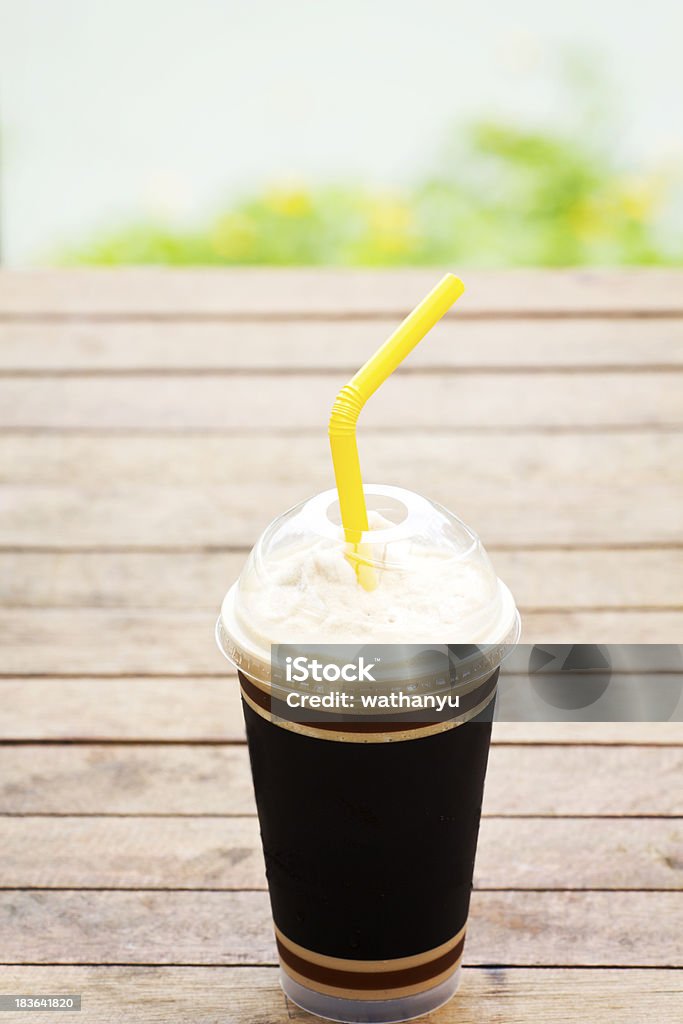 Inviting iced drink in a covered cup Inviting iced drink in a covered cup . Architectural Dome Stock Photo