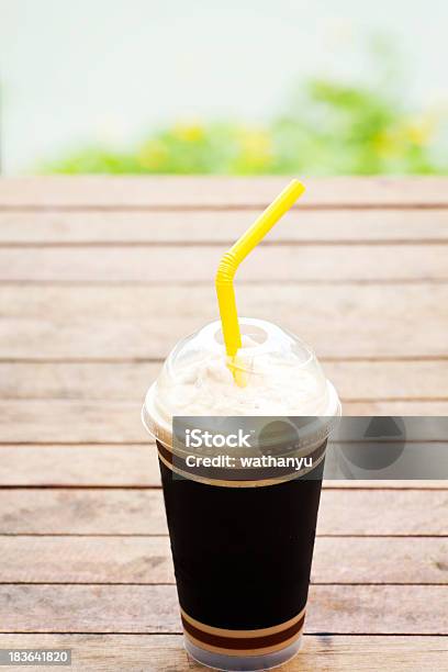 Inviting Iced Drink In A Covered Cup Stock Photo - Download Image Now - Architectural Dome, Brown, Bubble Tea