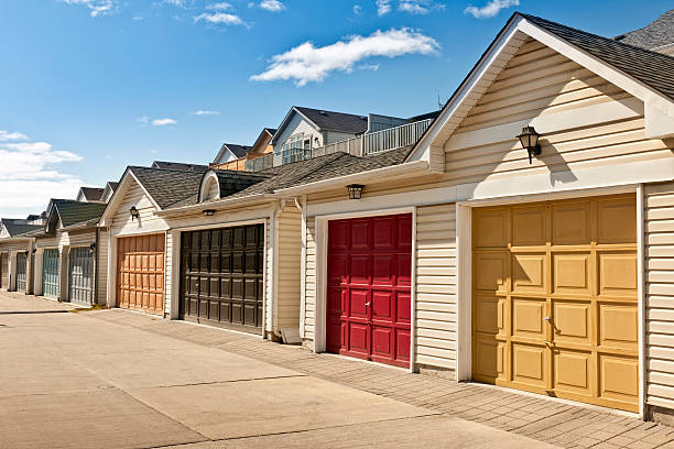 Row of garage doors at parking area for townhouses