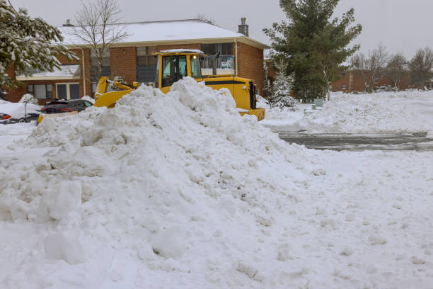 after heavy snowfalls, a snowplow truck removes snow from parking lot - snowplow snow parking lot pick up truck imagens e fotografias de stock