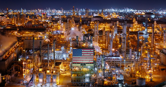 Aerial view of an oil refinery in Wilmington, a neighborhood in the South Bay and Harbor region of Los Angeles, California, on a clear night.