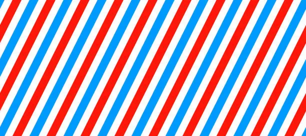 Vector illustration of Barber shop pole background. Abstract diagonal line seamless pattern. Striped repeating wallpaper. Red, white and blue candy cane repeated texture. Vector wrapping paper backdrop.