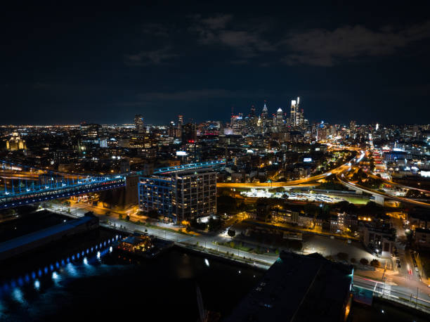 istock Downtown Philadelphia Skyline with Expressway and Ben Franklin Bridge in Frame at Night 1836542805