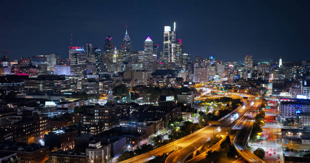 istock Downtown Philadelphia Skyline with Expressway in Foreground on Cloudy Night in Fall 1836544859