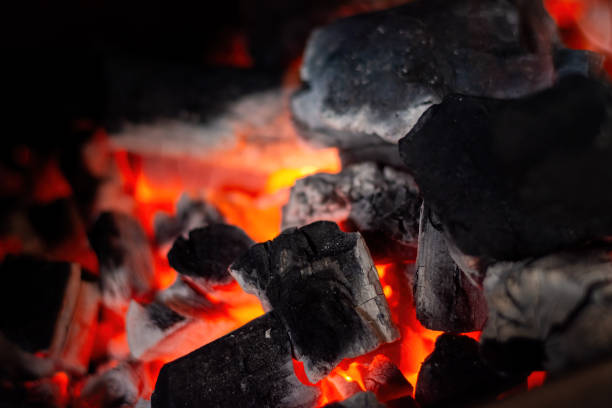 istock Flaming Hot Charcoal Briquettes 1836565459