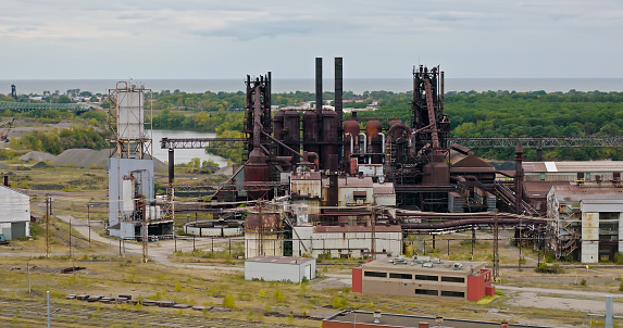 Aerial shot of a shuttered steel mill in Lorain, a city in Lorain County, Ohio, on an overcast day in Fall.