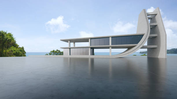 Abstract architecture design of modern building. Empty parking area concrete floor with beach and blue sky sea view.