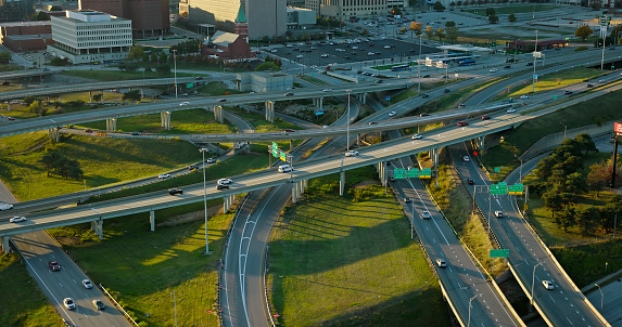 Aerial still image of Interstate 70 and U. S. Highway 71 running through Kansas City, Missouri at sunset. \n\nAuthorization was obtained from the FAA for this operation in restricted airspace.