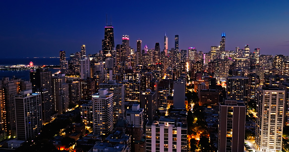 Aerial shot of Near North Side, Chicago at twilight in Fall.