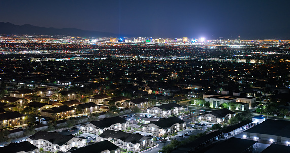 Aerial view of Henderson, a city in Clark County, Nevada, at night in Fall.

Authorization was obtained from the FAA for this operation in restricted airspace.