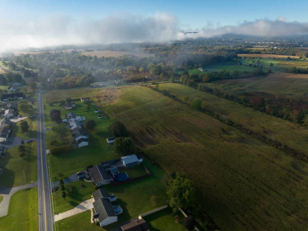 istock Houses Surrounded by Fields in Rural Pennsylvania - Aerial 1836654972