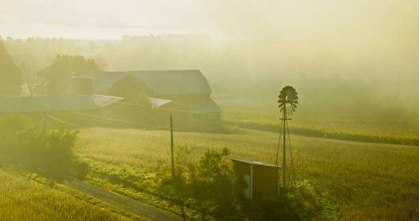 Wisconsin farmland and trees starting to change color in September, horizontal
