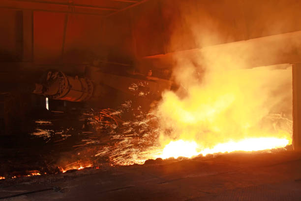 istock hot molten iron flowing from blast furnace 1836673790