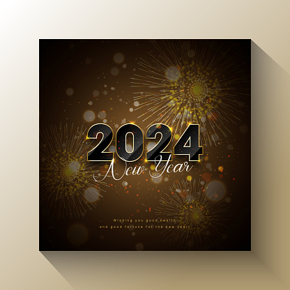 Enjoy the fireworks spectacular for the New Year' Eve 2024 with outline of gold colored 2024 glittering on the fireworks background