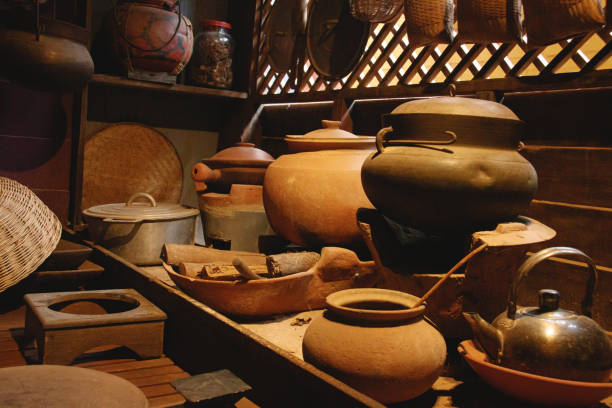 istock Clay pots and wooden kitchen utensils in a traditional khmer kitchen 1836691749
