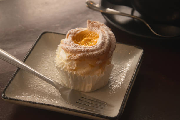 Close up of a brazo de mercedes cupcake, a popular authentic Filipino dessert