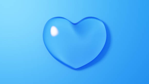 istock 3D Illustration.Transparent ice-glass heart on blue background. (horizontal) 1836734464
