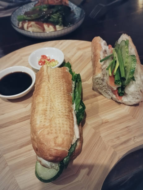 istock A khmer baguette sandwich packed with pork, pate and salad called num pang 1836749303
